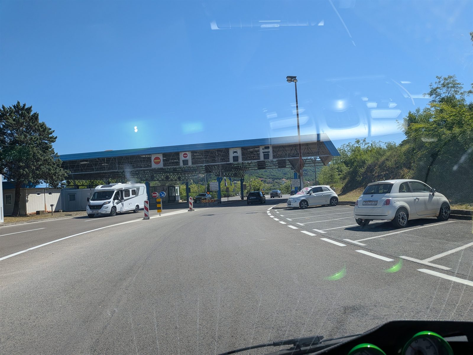 Croatia to Slovenia border crossing seen through the windscreen